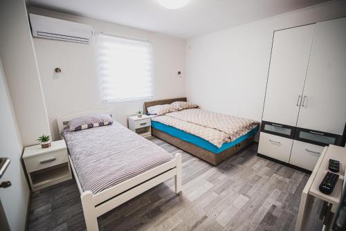 Postel nebo postele na pokoji v ubytování CUDERLAND -CUKR