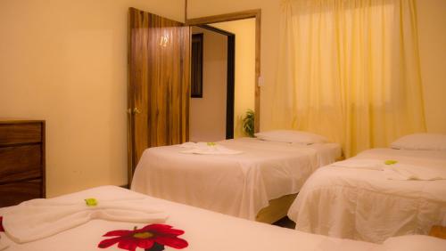 Katil atau katil-katil dalam bilik di Monte Los Lirios Lodge