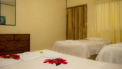 Katil atau katil-katil dalam bilik di Monte Los Lirios Lodge