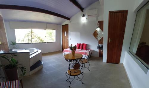 Χώρος καθιστικού στο Pousada Santa Fe de Penedo