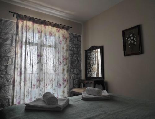 Posteľ alebo postele v izbe v ubytovaní Meterizi Guesthouse