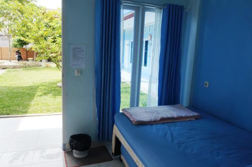 Katil atau katil-katil dalam bilik di Kenari Residence