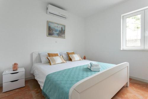 Postel nebo postele na pokoji v ubytování Apartment Maestral