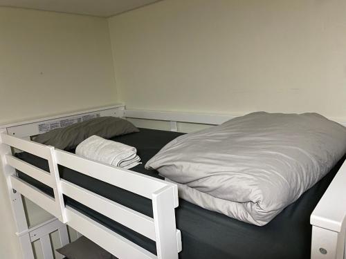a white bunk bed in a small room at Single Size TOP Bunk Bed - Mixed Shared ROOM in Miami