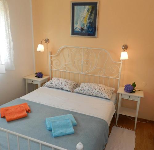 Postel nebo postele na pokoji v ubytování Mata Apartments