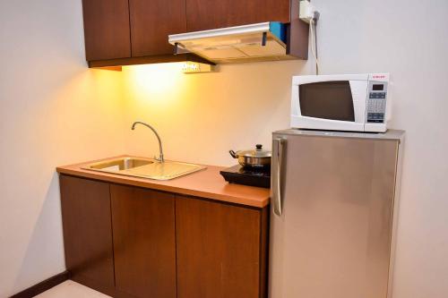 Η κουζίνα ή μικρή κουζίνα στο Ritz Garden Hotel Manjung