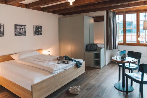 מיטה או מיטות בחדר ב-Hotel Müllerhof