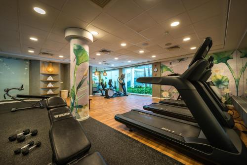 a gym with treadmills and a treadmill in a room at Yam Suf by Isrotel Collection in Eilat