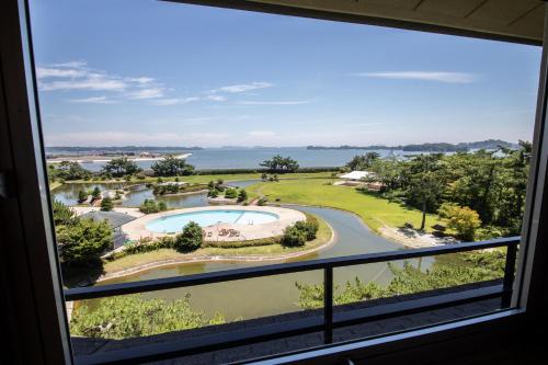 a view of a pool from a window at Matsushima Ichinobo in Matsushima