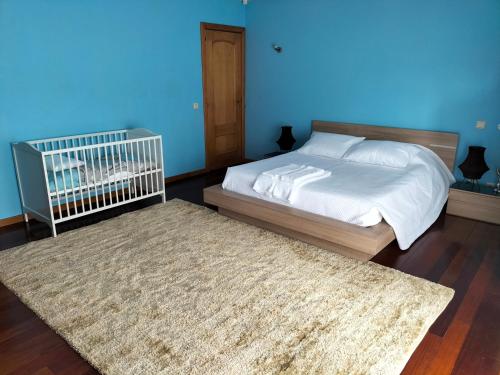 Villa Poça tesisinde bir odada yatak veya yataklar