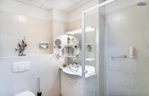 Koupelna v ubytování Hotel Badehof