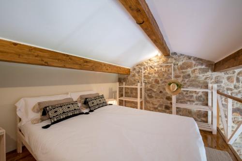 Postel nebo postele na pokoji v ubytování Granja Sierra Hermosa
