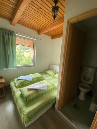 Bed and Breakfast Umoljaniにあるベッド