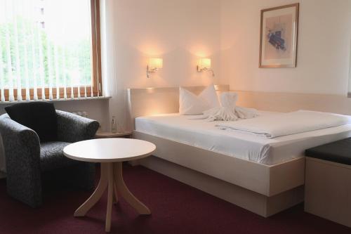 Postel nebo postele na pokoji v ubytování Hotel Scirocco