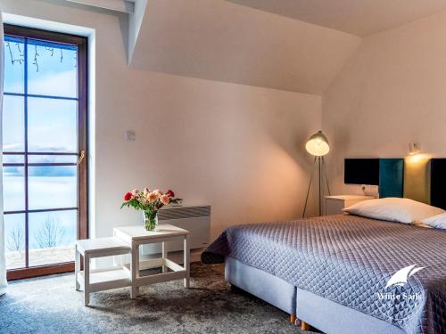 Ein Bett oder Betten in einem Zimmer der Unterkunft White Sails Solina