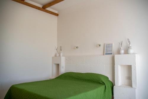 A bed or beds in a room at Agriturismo Antares