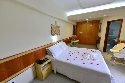 Ένα ή περισσότερα κρεβάτια σε δωμάτιο στο Vind's Plaza Hotel