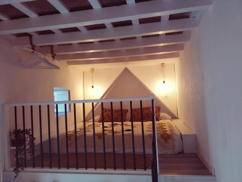 Postel nebo postele na pokoji v ubytování La Fuente 14, Casa Solariega en Pleno Centro