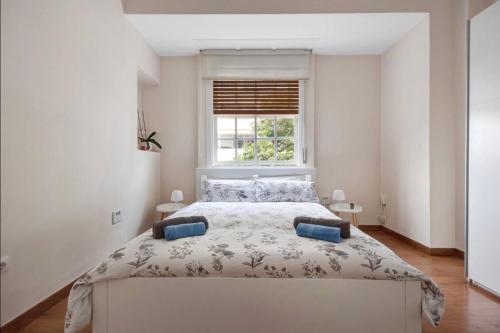 Ένα ή περισσότερα κρεβάτια σε δωμάτιο στο PISO AUDITORIO CENTRO LA OROTAVA