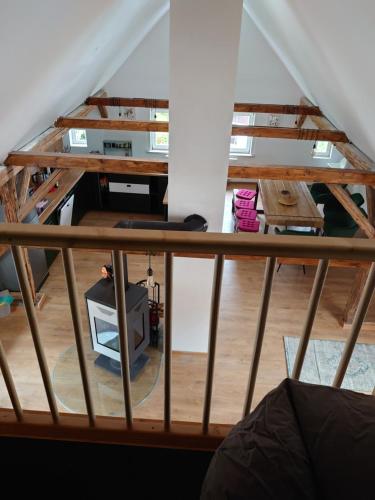 a view from the top of a loft with a desk at Historisches Aschberg Haisl Klingenthal, Terrasse, großer Garten 6 plus 2 Personen in Klingenthal