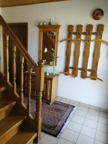 a staircase in a house with a stair case at Karolinenhof in Schüttorf