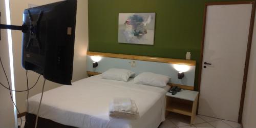 Postel nebo postele na pokoji v ubytování Apart Hotel Quartier Latin