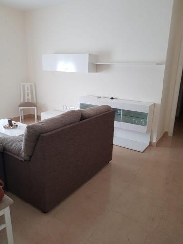 a living room with a couch and a table at Piso en Arcos de la Frontera in Arcos de la Frontera