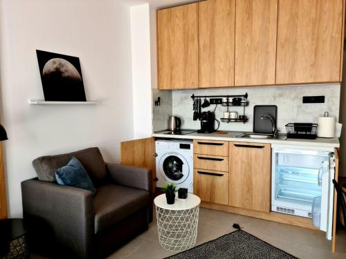 Kuchyň nebo kuchyňský kout v ubytování Studio Greenn Life Beach Resort