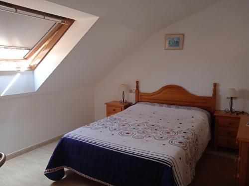 Posteľ alebo postele v izbe v ubytovaní Apartamentos Turísticos O Pescador