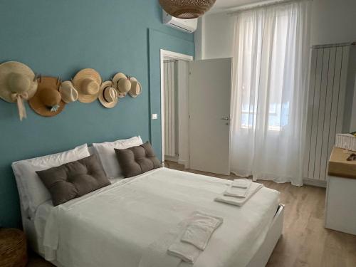 Giường trong phòng chung tại Casa Aiga Marina