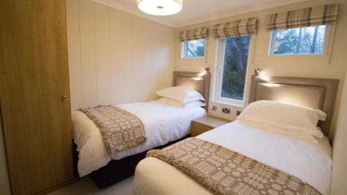 Lova arba lovos apgyvendinimo įstaigoje Llyn Brenig Lodge