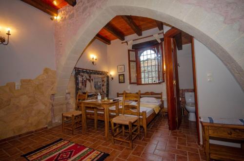 Гостиная зона в STAMATOGIANNIS Traditional Apartments