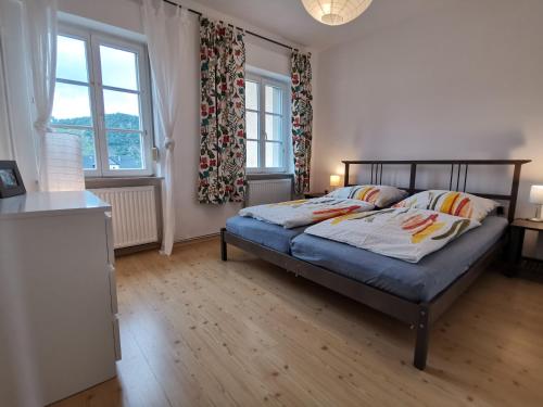 Llit o llits en una habitació de Ferienhaus Lenz