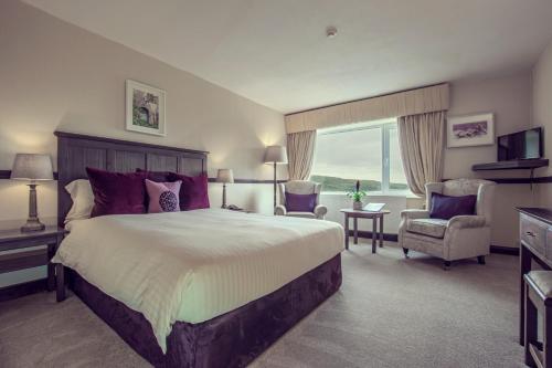 A bed or beds in a room at Ardagh Hotel & Restaurant