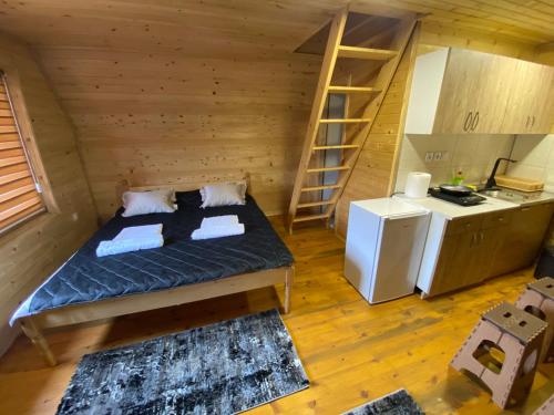 Postel nebo postele na pokoji v ubytování Etno selo Kaćo