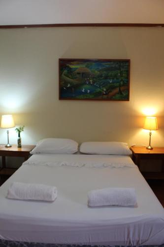 Letto o letti in una camera di Hotel La Omaja