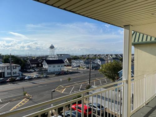 a view of a parking lot with a water tower at Sea Palace Inn in Seaside Heights