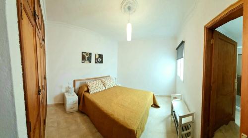 Кровать или кровати в номере Casa Los Álamos