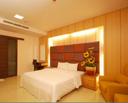 Ένα ή περισσότερα κρεβάτια σε δωμάτιο στο Charming Motel