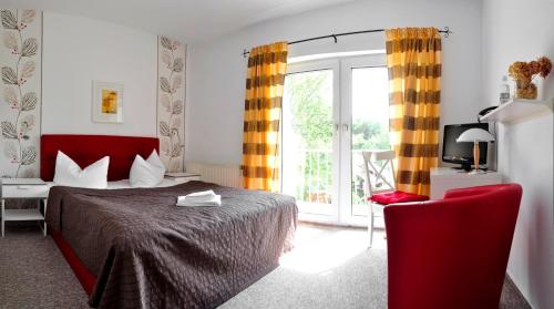 Giường trong phòng chung tại Hotel Annablick