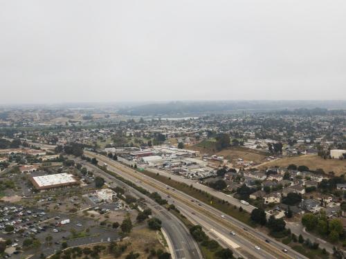 an aerial view of a city with a highway at Days Inn by Wyndham Arroyo Grande Pismo Beach in Arroyo Grande