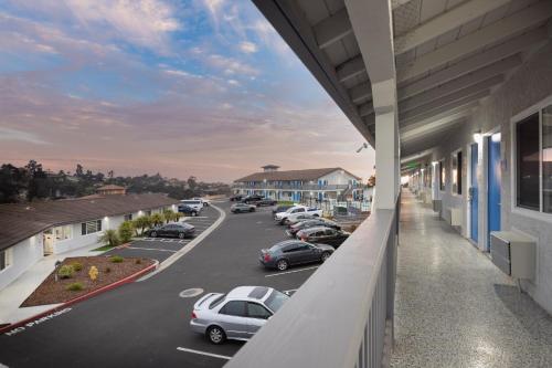 a view of a parking lot from a building at Days Inn by Wyndham Arroyo Grande Pismo Beach in Arroyo Grande