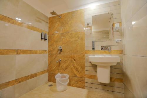 a bathroom with a toilet and a sink at Hotel A Star - 50 Meter From Golden Temple in Amritsar