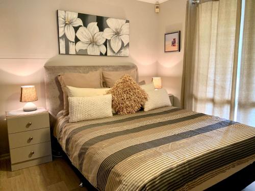 Cama o camas de una habitación en Pine View Holiday Rental