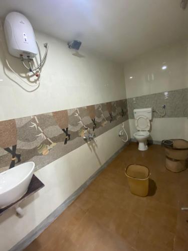 Et badeværelse på Hotel New Shiv Kunj