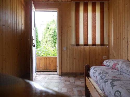 Ein Bett oder Betten in einem Zimmer der Unterkunft Pension, Camping & Biker Station zur Deutschen Eiche