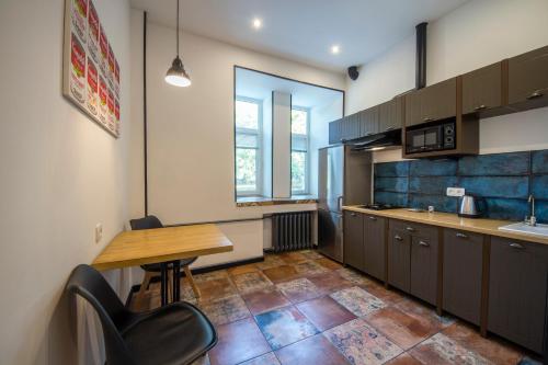 Кухня или мини-кухня в Central Apartments Maidan Area
