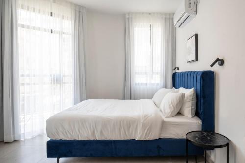 Krevet ili kreveti u jedinici u objektu De' Mar Florentine Hotel By Peraia