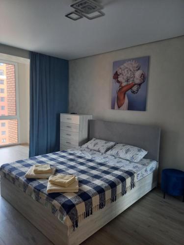 Ліжко або ліжка в номері Апартаменти в ЖК Яровиця біля ТРЦ Промінь