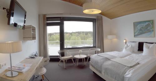 Postel nebo postele na pokoji v ubytování Hotel Njord